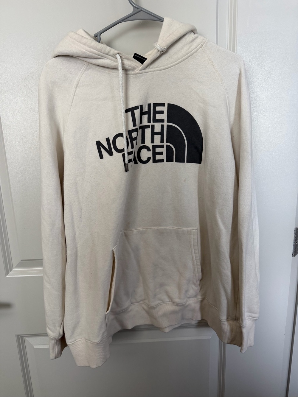 The North Face Cream Hoodie with Black Logo